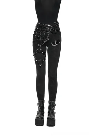 Women's black gothic pentagram harness pants front three-quarter view showing studded waistband and leg straps