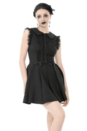 Black gothic sleeveless dress with Peter Pan collar, lace trim, and satin waist bows - front three-quarter view on model
