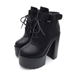 Black gothic platform lace-up ankle boots with block heel and round toe, frontal studio view showing matte PU leather finish