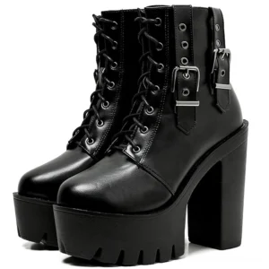 Black gothic platform ankle boots with lace-up closure and metal buckle straps, 3/4 front studio view showing square heel and round toe