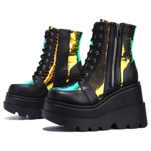 Black holographic platform combat boots front view with color-shifting iridescent gold panels, thick platform heel, and side zipper detail
