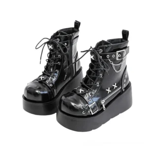 Women's black gothic platform ankle boots with cross rivet decorations and side zipper - front three-quarter view