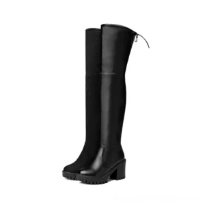 Black gothic platform over-the-knee boots front three-quarter view with lace-up back detail and lug heel