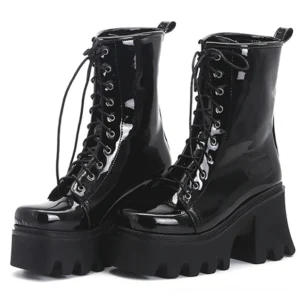 Black gothic lace-up platform combat boots front three-quarter view patent leather finish chunky lug sole