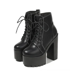 Black gothic platform ankle boots with chunky square heel and lace-up closure, front-side elevated view