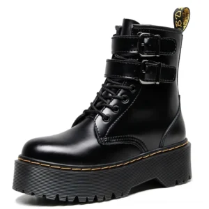 Side profile of black gothic platform combat boot with yellow stitching detail on rubber sole, highlighting the square heel and mid-calf silhouette