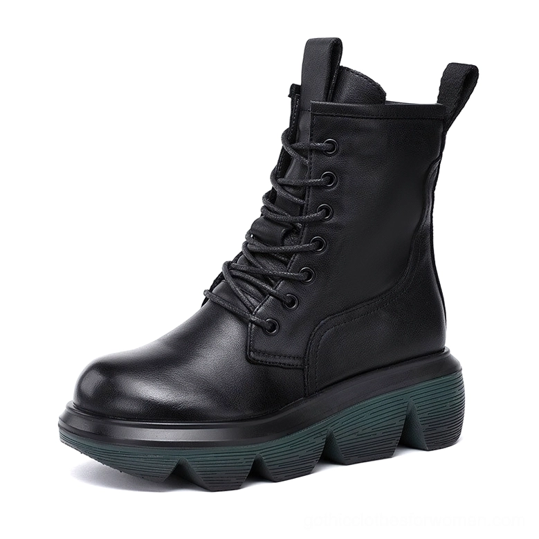 Black leather gothic platform combat boots with lace-up front and thick lug sole, side three-quarter view