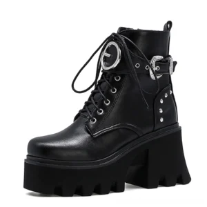 Black gothic platform combat boots with metal buckles and studded details, left three-quarter view showing architectural square heel and PU leather upper
