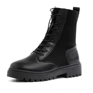 Black platform combat boots for women - gothic lace-up ankle boots with knitted collar and lug sole, side view on white background