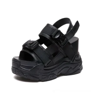 Black gothic platform buckle sandals with chunky wedge sole, open-toe design, and adjustable straps - alternative fashion footwear for women