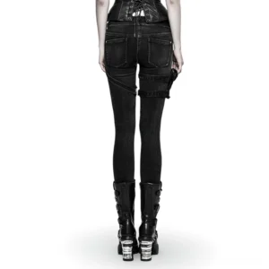 Black punk grunge skinny jeans rear view on model, showcasing back pockets and left leg strap pouch