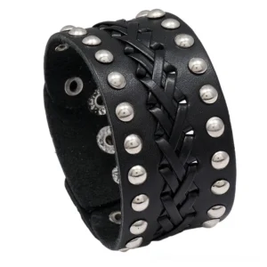 Black handwoven leather gothic punk cuff bracelet with silver rivets, wide design on white background showing front oblique view