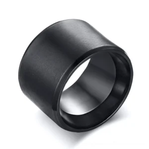 Black stainless steel gothic ring with matte finish, 3/4 front oblique view showing substantial band width and polished inner bore detail