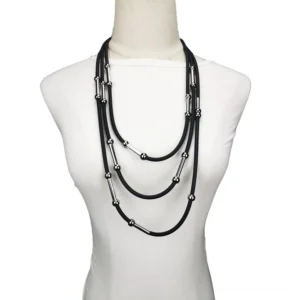 Black gothic rope necklace multi-layer strands with silver metal accents on mannequin front view