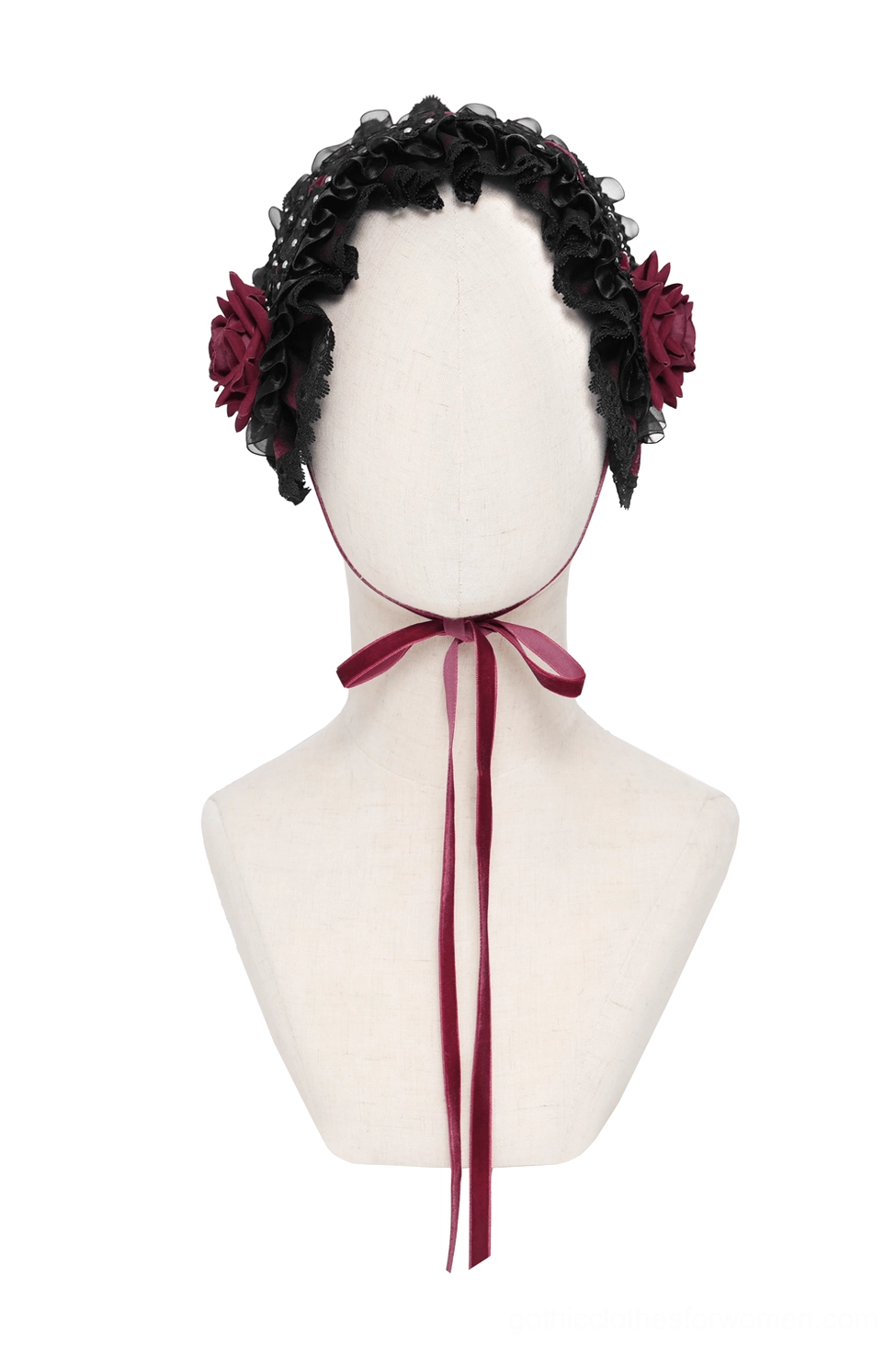 Front view of black Victorian Lolita bonnet on mannequin with side rose decorations and intricate lace trim