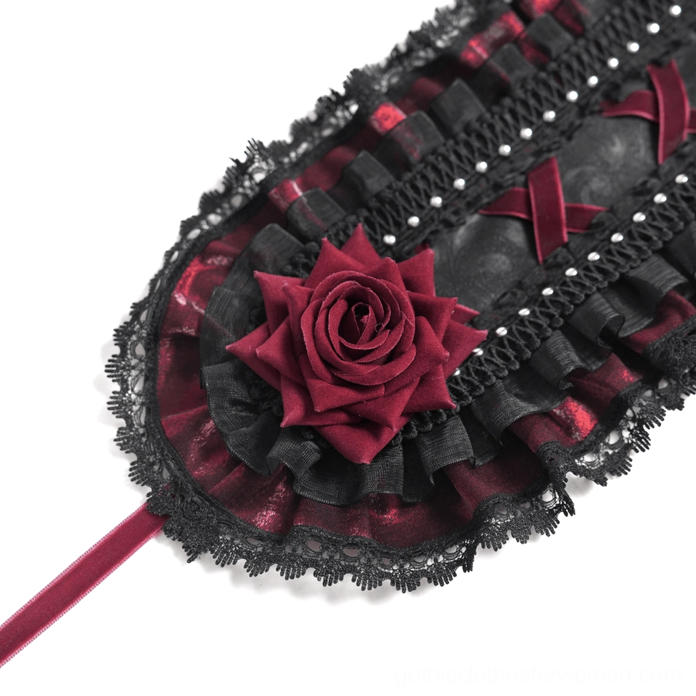 Additional texture detail of black gothic rose bonnet showing lace construction and stud embellishments
