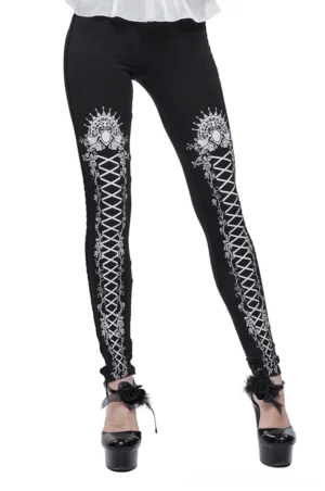 Black gothic rose lace-up leggings front full-body view on model with white ornamental print and embroidered waistband