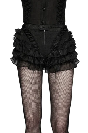 Black gothic ruffle lace shorts with diagonal drawstrings front view on model wearing fishnet tights