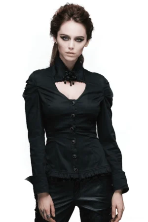 Black gothic stand collar shirt with flower pendant brooch front view on model, featuring cutout chest detail and elegant silhouette
