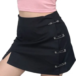 Black A-line gothic mini skirt with safety pin side clips and asymmetrical slit detail, front close-up view
