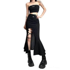 Gothic black flared skirt three-quarter view with crisscross strap and metal buckle paired with cropped tube top