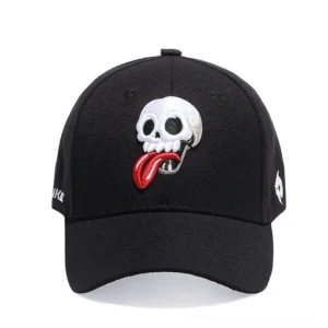 Alternative skull baseball cap front view - black gothic cap with prominent embroidered tongue-out skull motif