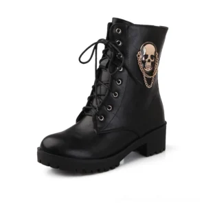 Black gothic ankle boots with metal skull and gold chain ornament, displayed on white background showcasing lace-up combat styling and platform sole