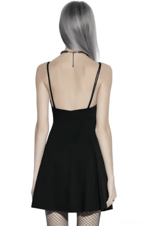 Black gothic slip dress back view showing low back cutout design and spaghetti straps on model