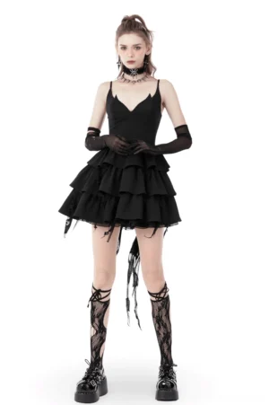 Black gothic lace slip dress with layered ruffle skirt and fringe hem, front full-body view on model
