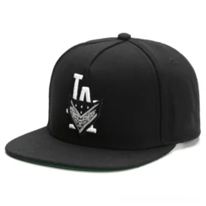 Black gothic snapback cap front three-quarter view with white LA embroidered badge logo and green underbrim detail