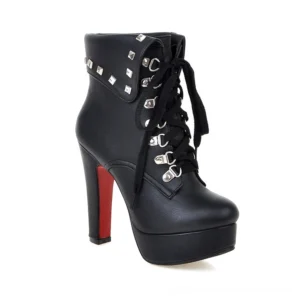 Black studded lace-up gothic platform ankle boots with spike heel, side profile view showcasing metal rivet details and red heel sole