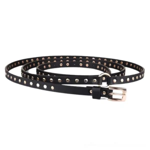 Coiled black thin studded belt with gold rivet trim and dual buckles, top-down flat lay showcasing full length and strap design