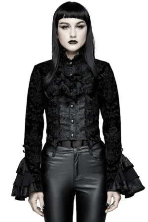 Black gothic tailcoat jacket with damask lace front view on model with blunt bangs, featuring ruffled collar and flared cuffs against white studio background