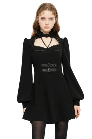 Black gothic techwear dress with detachable chain harness and square neckline, front view on model featuring bishop sleeves and fitted waist