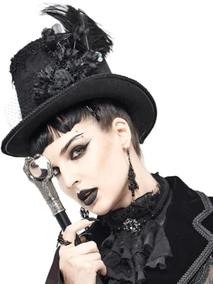 Black gothic top hat with detachable ostrich feather and 3D fabric flowers, worn by female model in left oblique view showing lace trim and feather detail