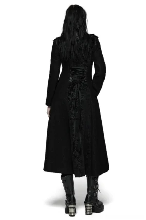 Black gothic wool coat rear view on model, featuring intricate lace-up corset back design with ribbon fasteners and floral jacquard embroidery