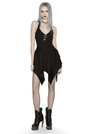 Front view of black halter asymmetric layered hem gothic mini dress on model with fishnet tights and platform boots