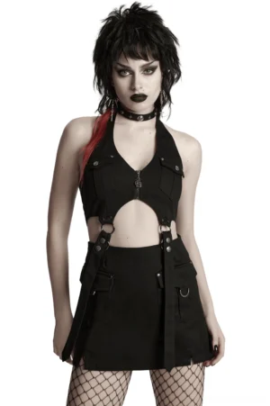 Black twill halter harness gothic dress front view on alternative model with red-streaked hair, featuring halter neck, front zipper, cutout waist, and cargo mini skirt with metal D-ring hardware