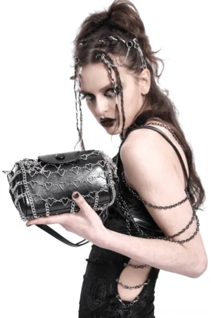 Black heart chain crossbody bag side profile – detail view of heart chain trim and bag structure
