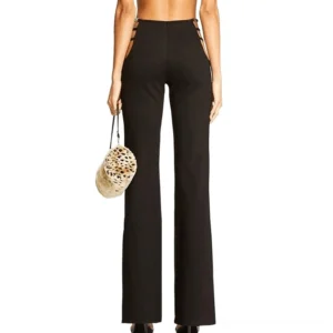 Black alternative high-waist pants with hollow straps styled with leopard print accessories