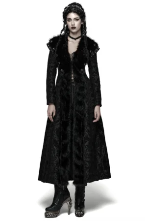 Women's black jacquard plush gothic long coat with faux fur collar trim and metal rivets, front full-body view on model with braided dark hair