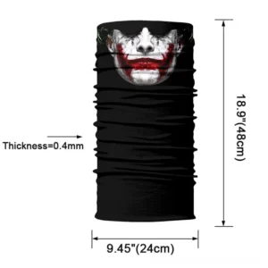 Black gothic Joker bandana neck gaiter in rolled flat lay position showing fabric texture, elasticity, and detailed clown face print design