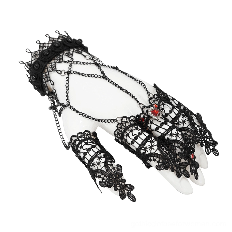 Black lace chain slave gloves with red gem embellishments displayed on white mannequin hand, showing detailed floral lace pattern and metal chains