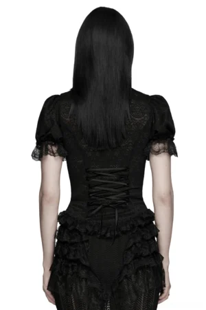 Black gothic lace corset blouse back view on model, featuring dramatic lace-up corset closure and ruffled hem with sheer lace back design