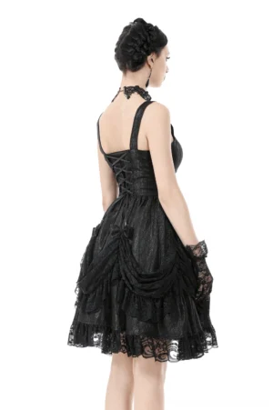 Black lace-up corset back detail of gothic slip dress, rear view on model showcasing lace trim