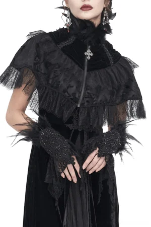 Model wearing black lace fingerless gloves with feather cuffs, styled with gothic velvet cape and dark alternative outfit