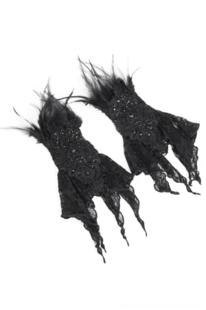 Top-down flat lay view of black lace fingerless gloves showing intricate embroidered pattern and fluffy feather cuff trim