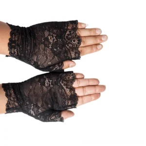 Top-down close-up of black lace fingerless gloves on female hands, displaying intricate floral lace texture and scalloped details
