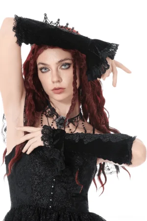 Front view of fingerless black lace gothic arm warmers with raised arms showing ruffled lace trim and floral design