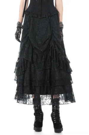 Black gothic lace skirt with layered ruffles worn by model showing full front view, demonstrating draped lace tiers and drawstring waist